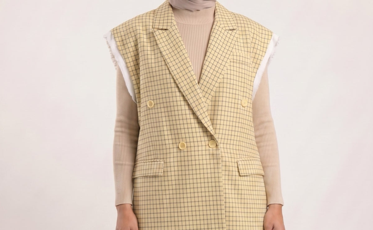 Detail du blazer a carreaux DS SHOP, visuel genere par IA